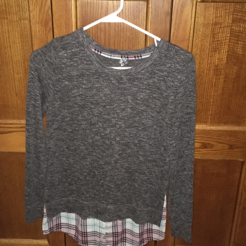 Grey blouse with flannel at the bottom.